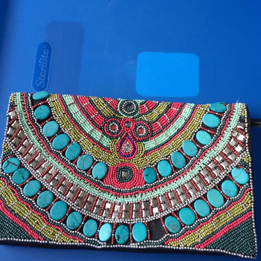 Bcbg hand beaded clutch.